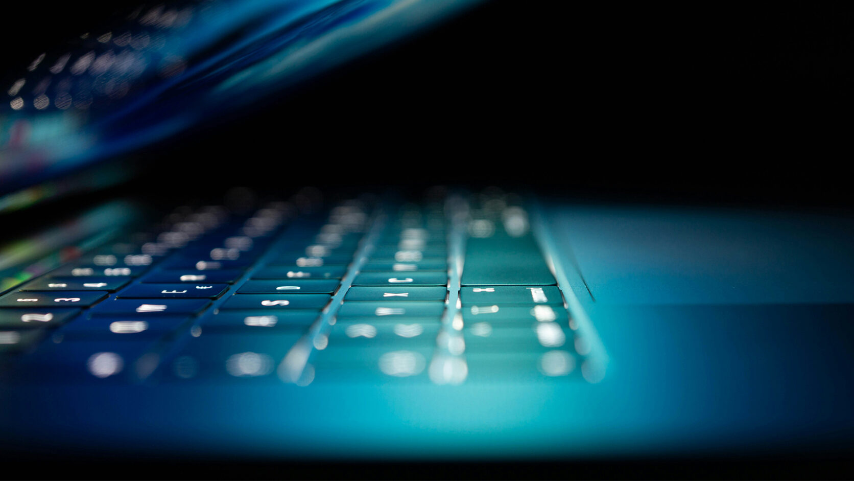 Concept image of data privacy featuring a slightly open laptop.